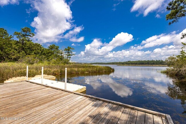 Building Photo - Fully furnished luxurious waterfront condo at The Inlet!