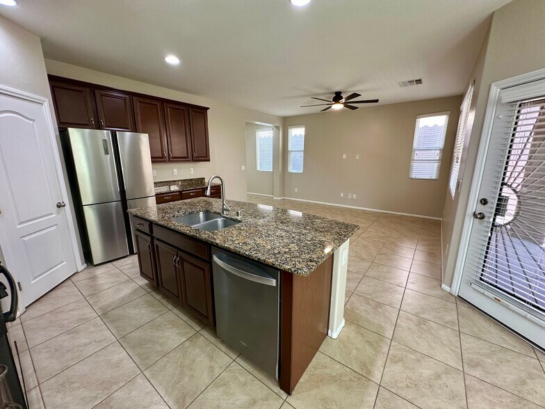 Kitchen / Living Room View - 9341 W Pearblossom Sky Ave