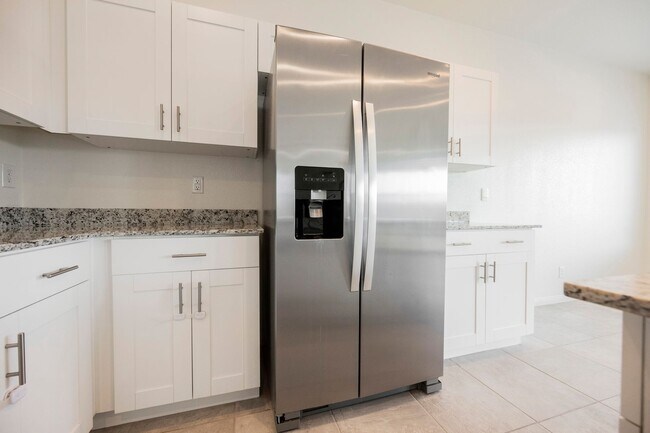 Building Photo - 402 Larksong Ave