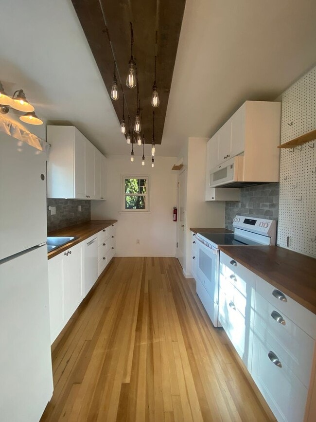 Building Photo - Perry District Gem – Move-In Ready 3 plus Bed / 2 Bath Brick Home with Finished Basement & 2-Car ...