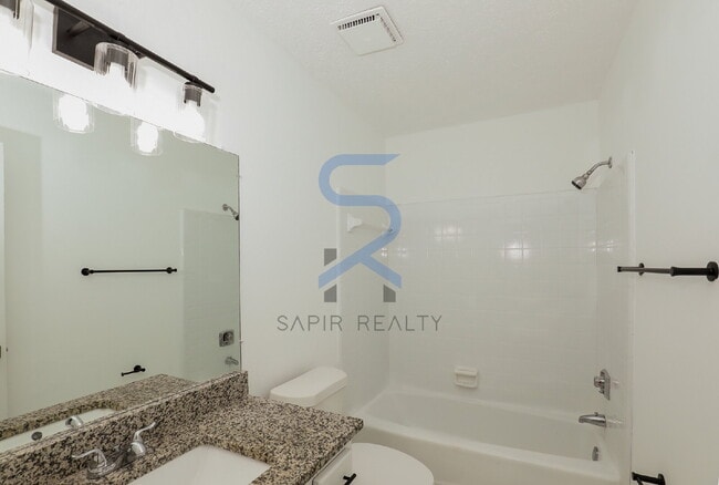 Building Photo - Move in before December 31st and choose your reward: a $250 Amazon Gift Card or a 55" Smart TV!