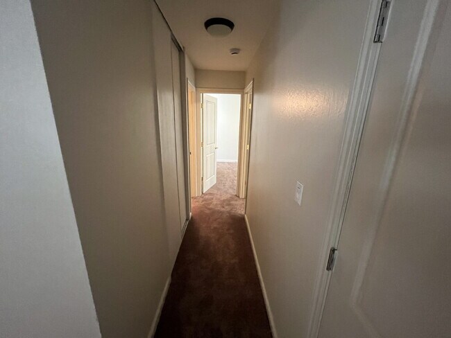 Building Photo - Downstairs 2 bedroom unit with parking and a patio