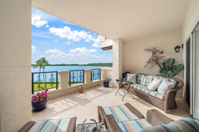 Building Photo - 2332 Fisher Island Dr