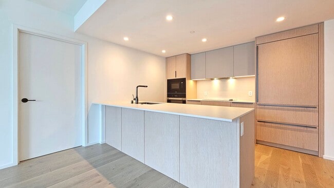 Building Photo - Stunning New 2BR Residence at The Park Ward Village