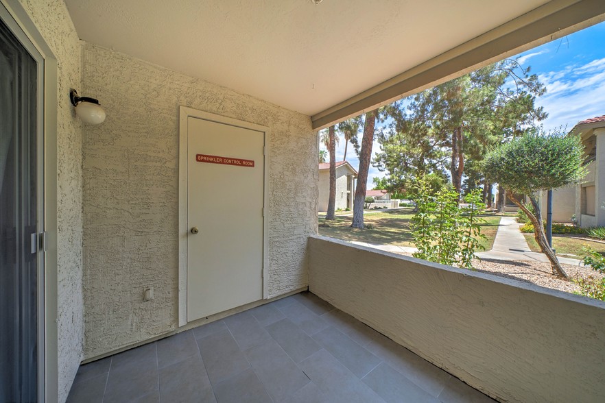 Patio with attached storage area - 10610 S 48th St