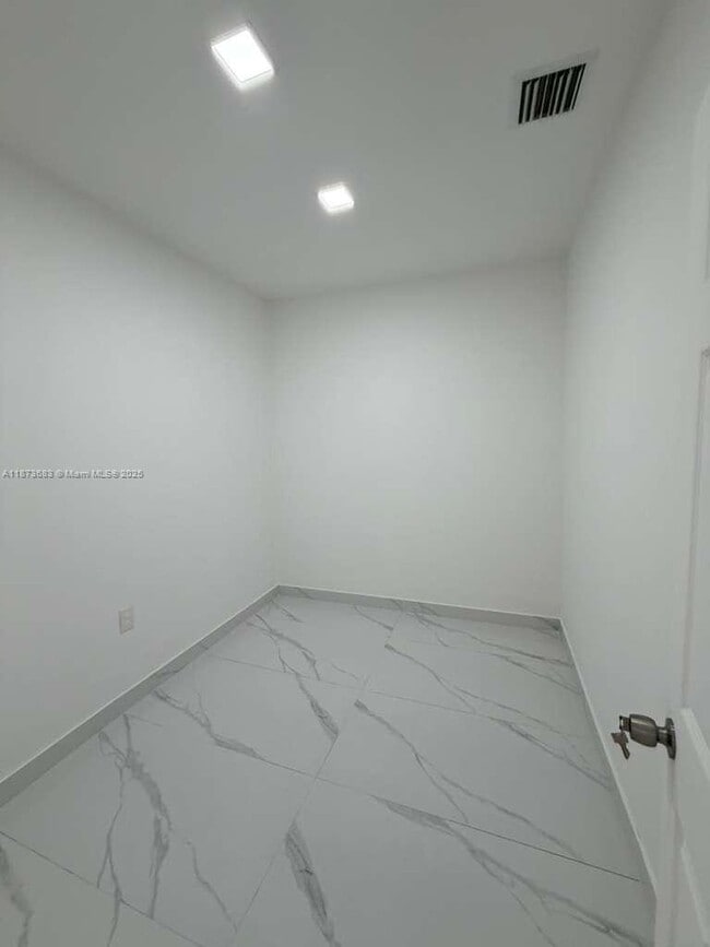 Building Photo - 6538 W 2nd Ct