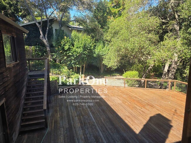 Building Photo - Spacious Home on a Private Wooded Lot Now Available!