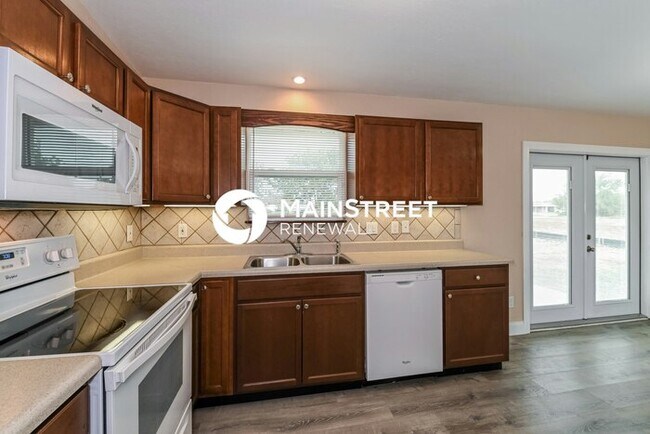 Building Photo - 3 Bedroom Pet-Friendly Home in CAPE CORAL, FL with Main Street Renewal