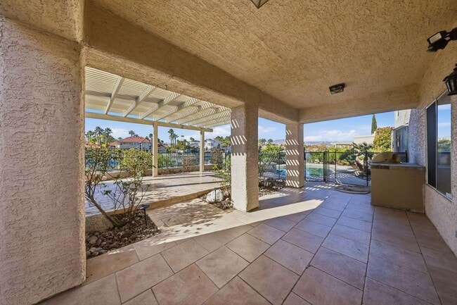 Building Photo - Luxury Lakefront Living in Desert Shores – 4 Bedroom Home with Private Dock & Stunning Views