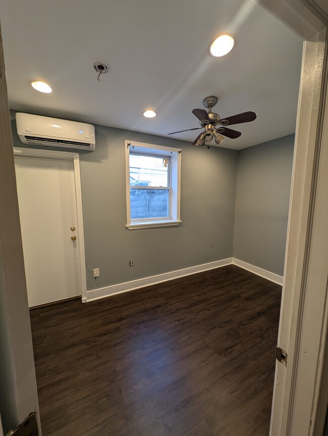 Downstairs bedroom with access to small yard - 1917 McClellan St