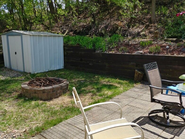 Backyard fire pit and patio space - 92 Logan Ave W
