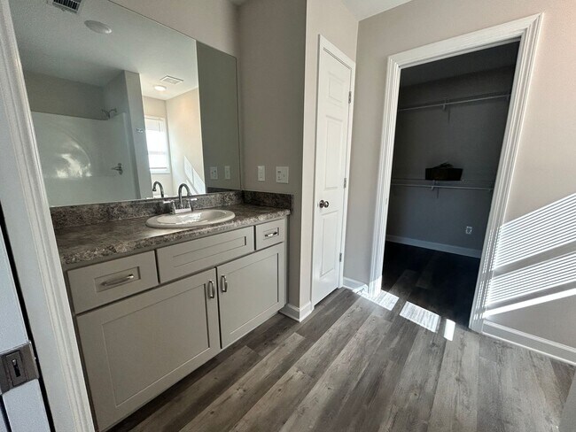 Building Photo - Three bedroom three bath available now!