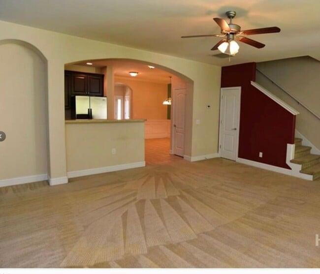 Building Photo - Townhome fresh paint and new carpet! Won't...