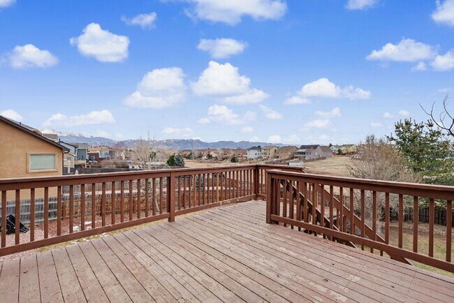 Building Photo - Spacious 5-Bedroom Home Backing to Open Space with Mountain Views