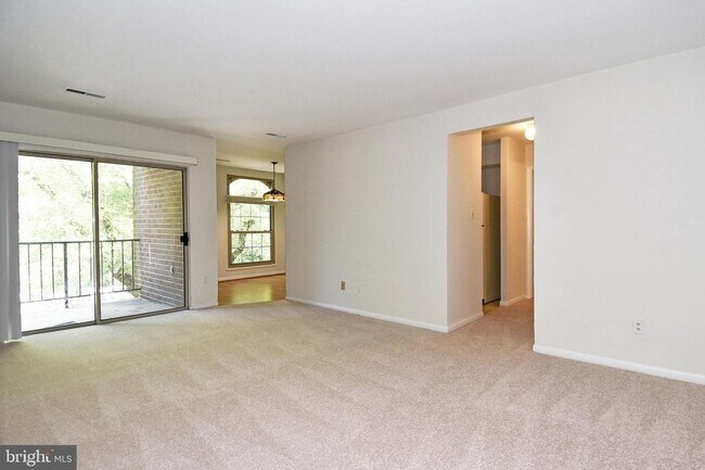 Building Photo - Commuter friendly location has easy access to I495 & Route 50. Metro bus stop in community.