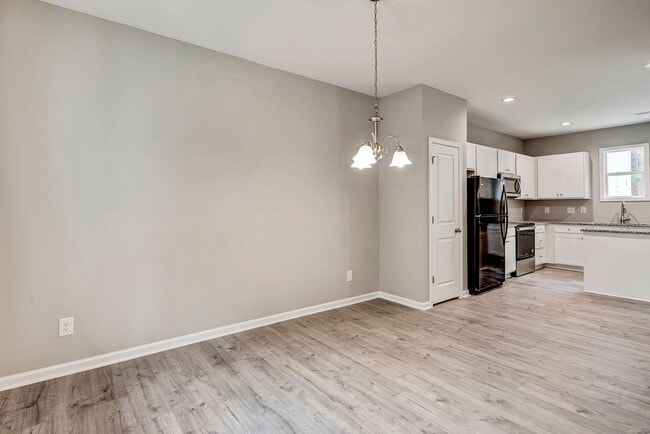 Building Photo - 4 Bedroom Townhouse for Rent in Clayton NC | Garage | Pet Friendly | Wooded View! | MOVE IN SPECI...