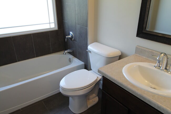 Building Photo - The Doll House -- Cool Two Bedroom at The Cottages on Vinton!