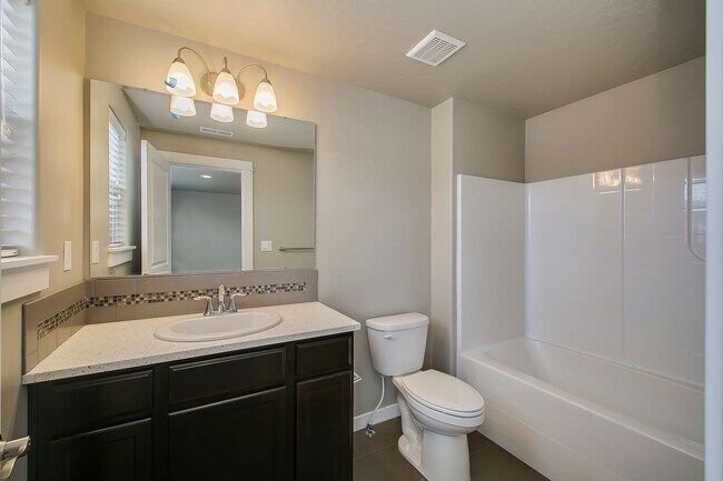 Building Photo - Close to Micron!  5 Bedroom 3 Full Baths -...