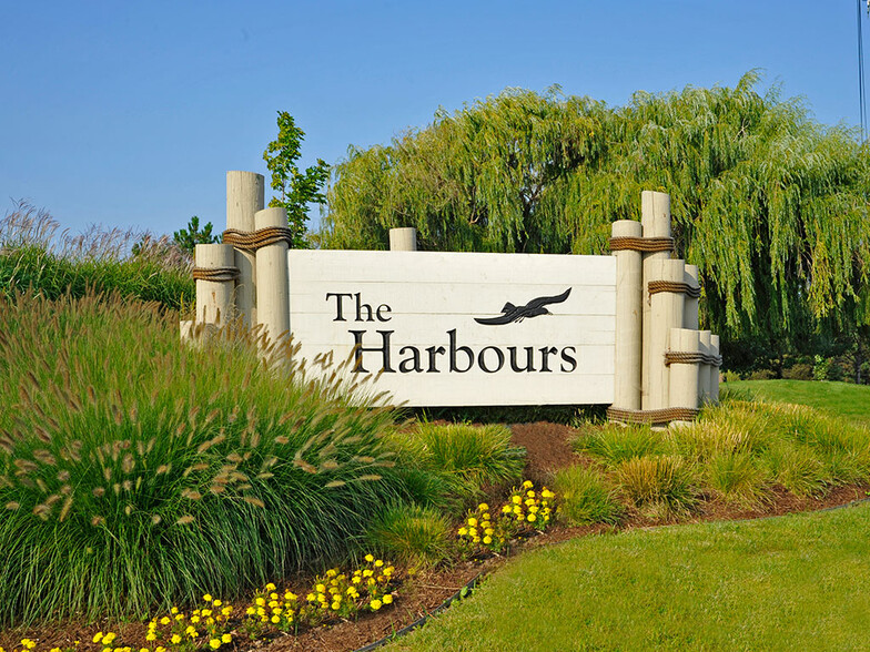 Entrance Sign - The Harbours Apartments