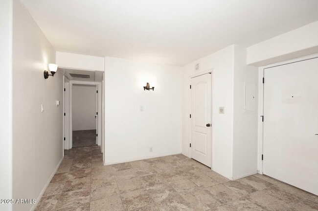 Building Photo - 7910 E Camelback Rd