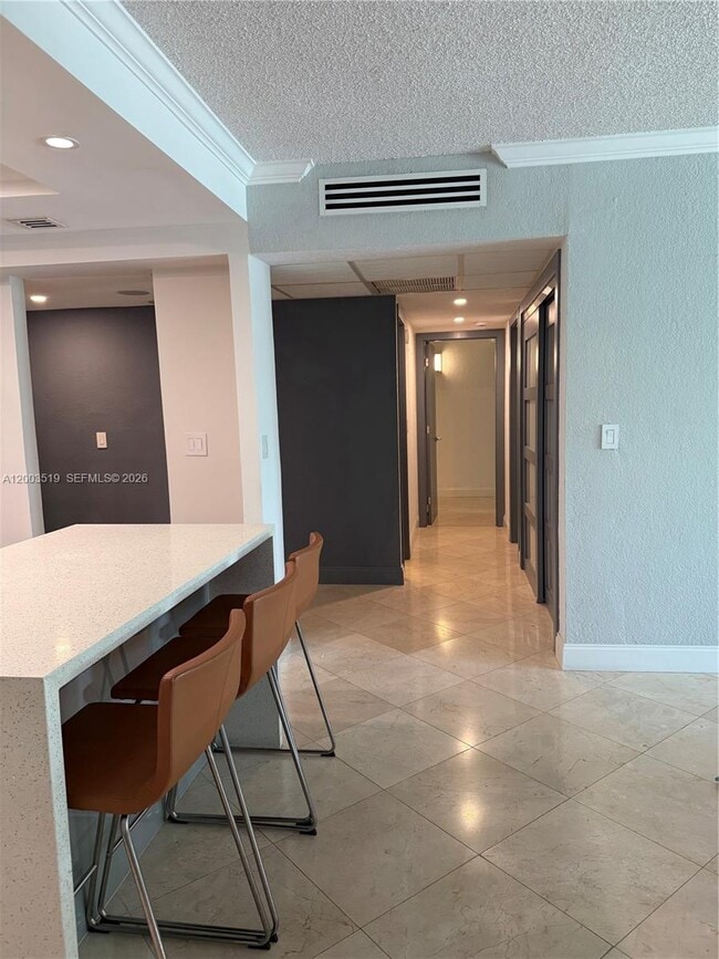 Building Photo - 19380 Collins Ave