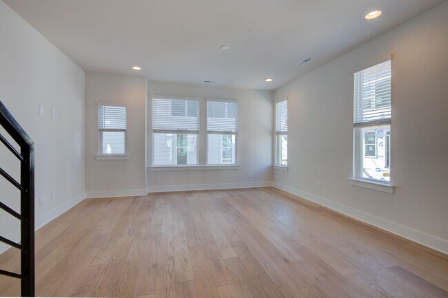 Building Photo - COMING SOON! Modern End-Unit Living Near Uptown | Rooftop Terrace + Tandem Garage