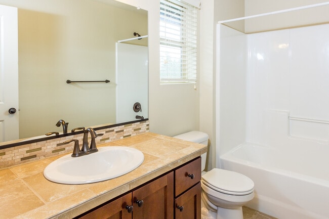 Building Photo - 4 Bedroom plus office 3 Bath Hills at Roun...