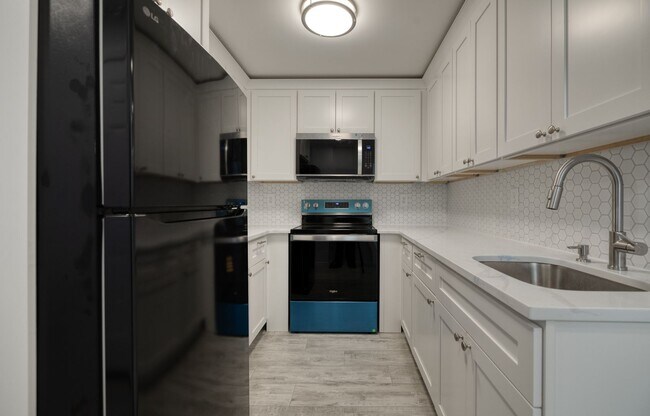 Building Photo - Storybook Tudor New Renovated | Two Full Kitchens | Full Finished Basement