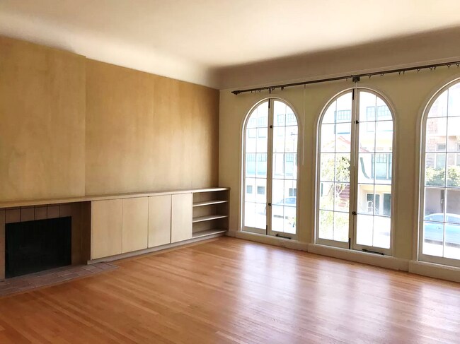 The Living Room has large french windows and lots of natural light - 319 Locust St