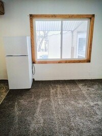 Building Photo - Alpine Efficiency Apartment #12