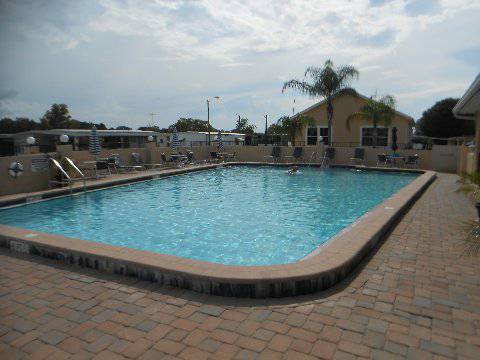 HEATED POOL WITH CHAIRS AND TABLES - 7331 Malaga Ave