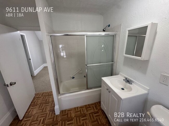 Building Photo - 9611 Dunlap Ave