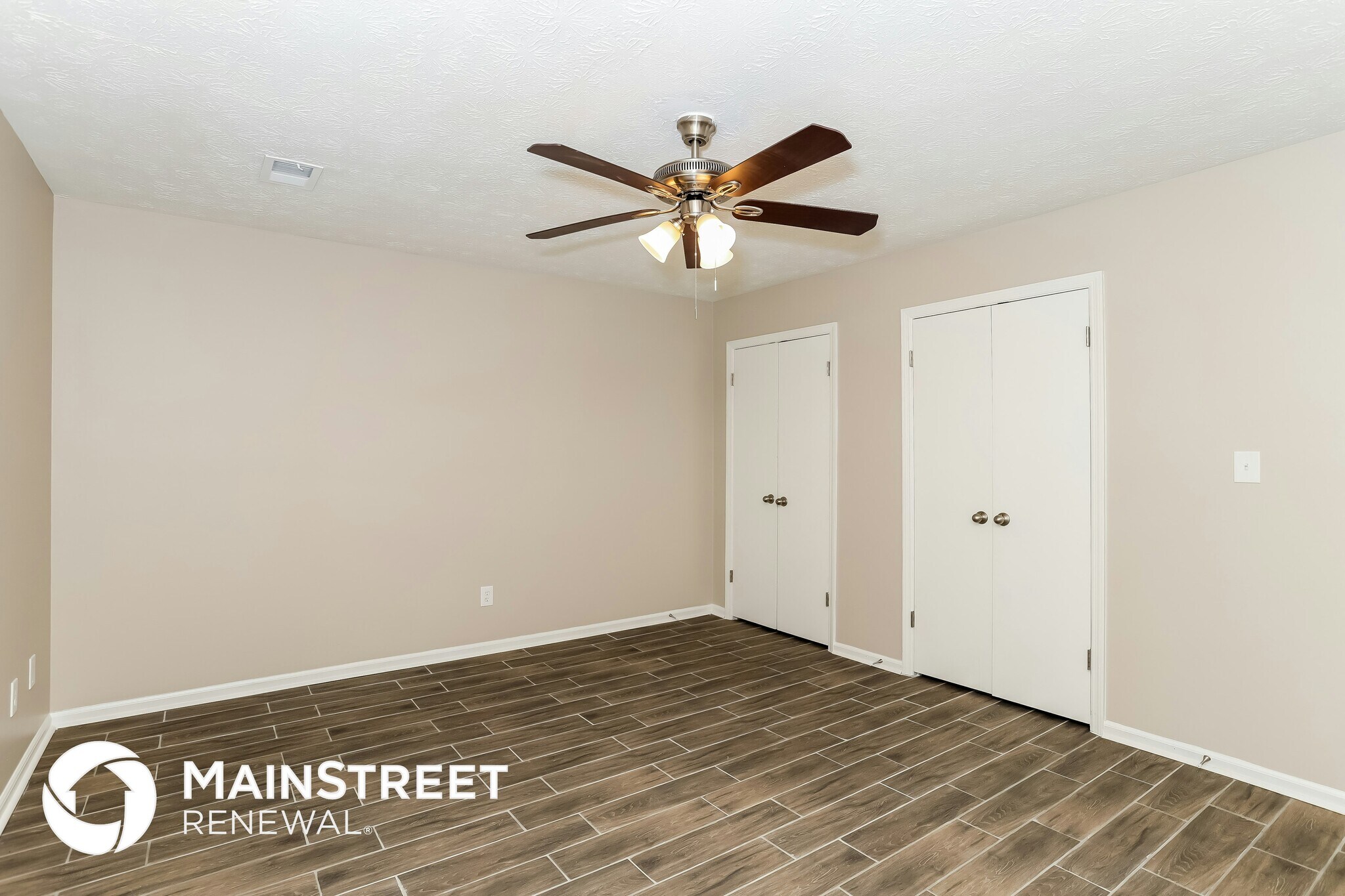 Building Photo - 9073 Woodgreen Way
