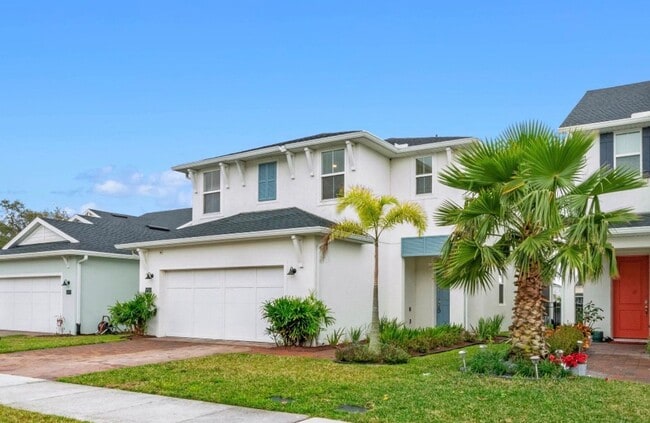 Building Photo - Water Front Home- 4 Large Bedrooms-3 baths Gated Community Call Sheila Campbell 407-687-7900