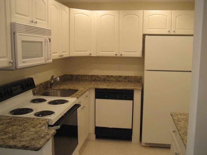 New white kitchen w/granite tops - 480 NW 20th St