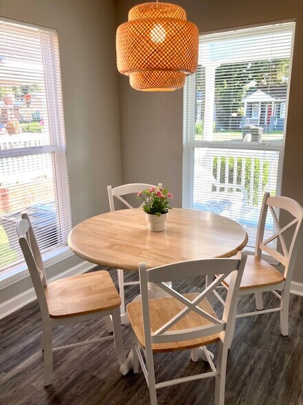 Dining Area with 42" Wood Pedestal Table - 1223 E Waldburg St