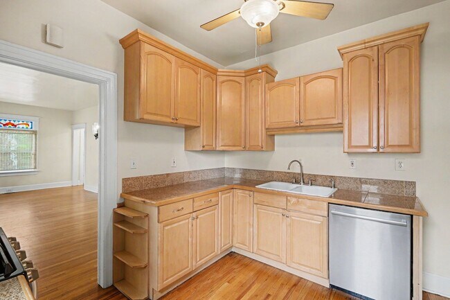 Building Photo - Beautifully Preserved Englewood Home with Fenced Backyard