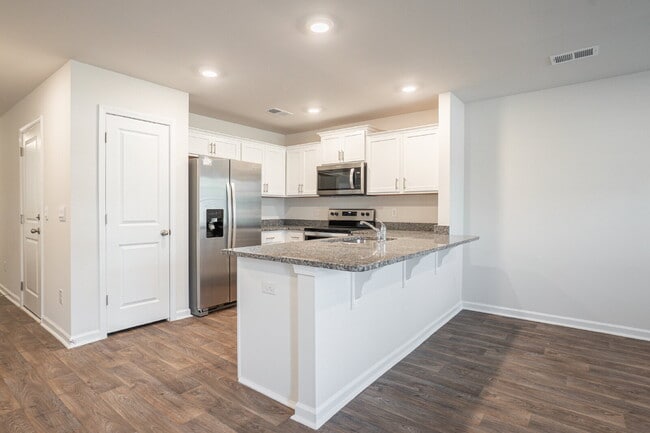 Building Photo - End unit! Available Early June!