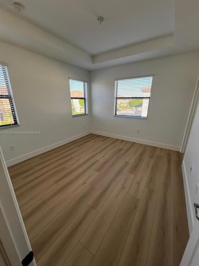 Building Photo - 9399 W 33rd Ln