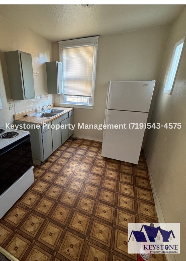 Building Photo - Ground Level, One Bedroom Apartment with A...