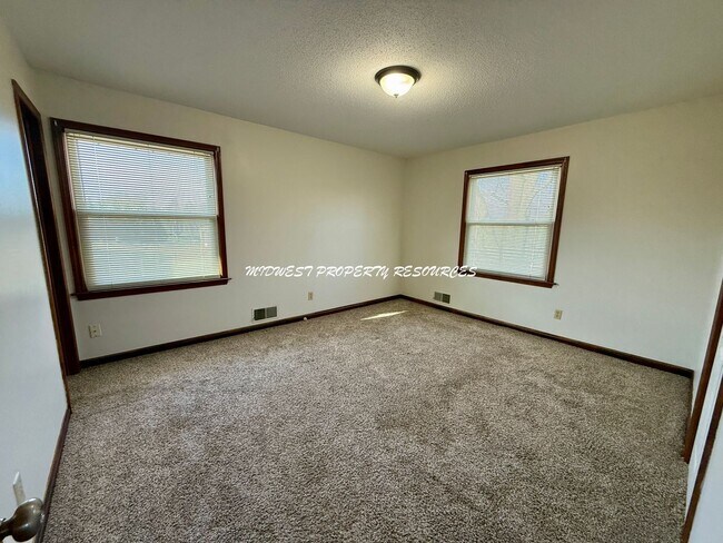 Building Photo - Spacious 3 Bedroom Home with Finished Lower Level & Large Fenced Yard