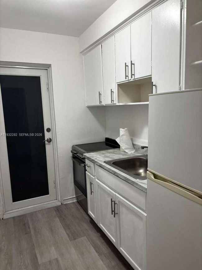 Building Photo - 9920 Collins Ave