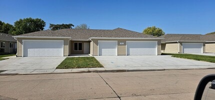 Building Photo - 2 bedroom, 1 bathroom apartment with 2 car attached garage