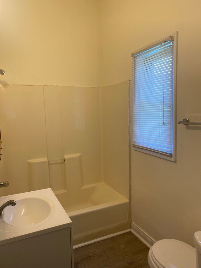 Building Photo - Updated three bedroom two bathroom home in...