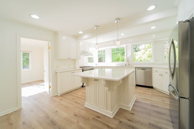 Building Photo - Gorgeous Hillsdale Home w/3 Decks, Picturesque Yard, Sauna, Garage & AC! Pets Welcome!