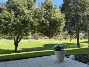 Building Photo - Enjoy stunning panoramic views of the golf...
