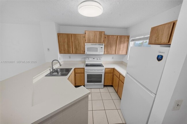 Building Photo - 8750 N Sherman Cir