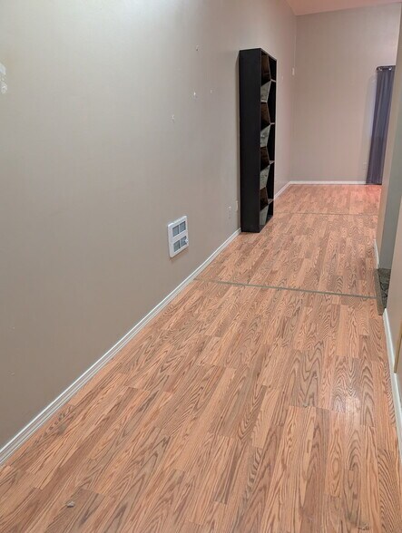 Hallway to bathroom behind kitchen - 4040 US Highway 93 N