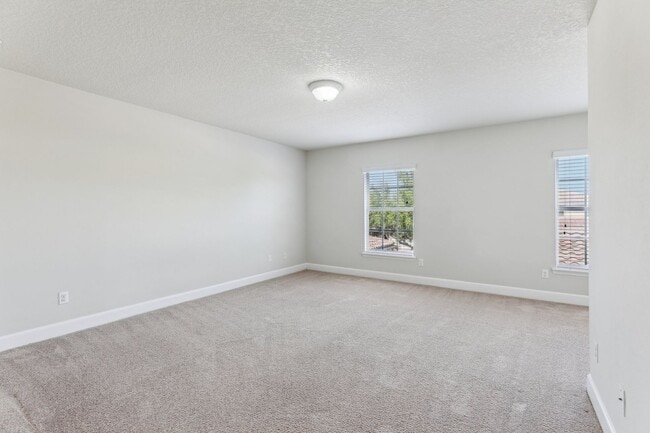 Building Photo - Gorgeous 3/3 Townhouse in VillageWalk of Lake Nona (Gated)