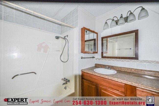 Building Photo - A cozy 3-bedroom, 2-bathroom home nestled on a corner lot